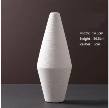 White textured vase on a dark background with measurements displayed.