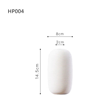White vase with dimensions labeled on a white background