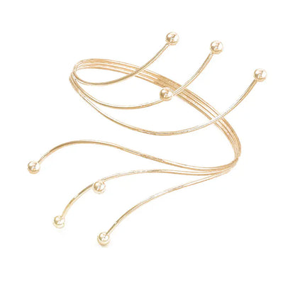 Gold necklace chain on a white background