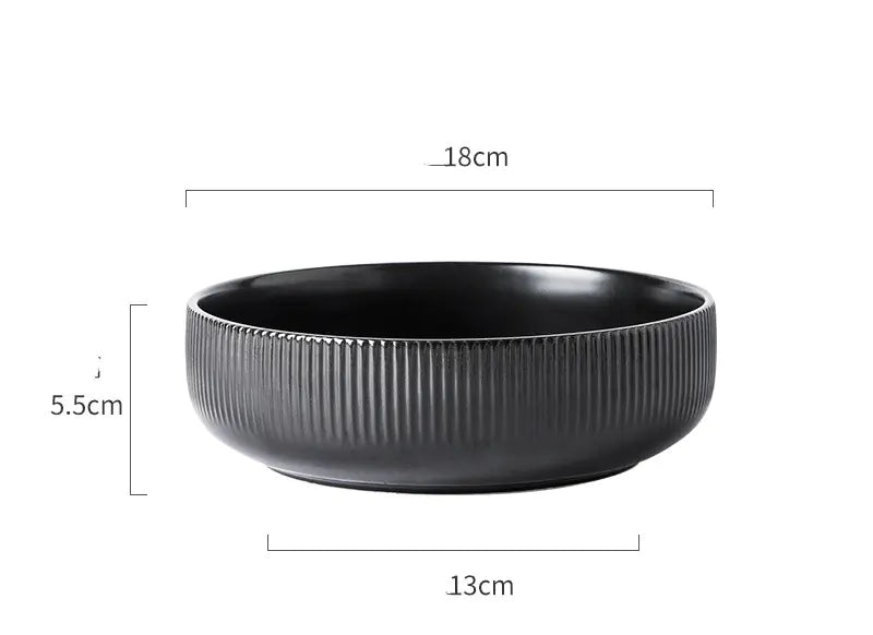 Black ceramic bowl with dimensions on a white background