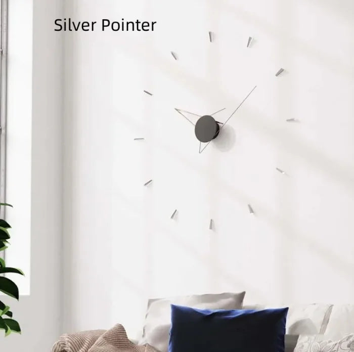 Wall clock with silver pointer in a room setting