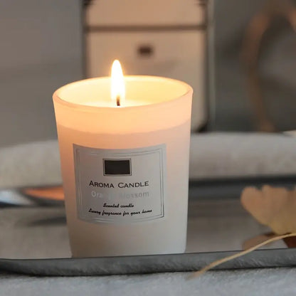 Aroma candle with a label on a surface
