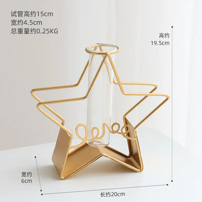Gold star-shaped holder with a clear glass tube on a white background, featuring dimensions.